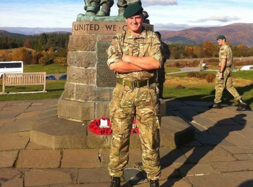 Ralph stood in front of the Commando Memorial
