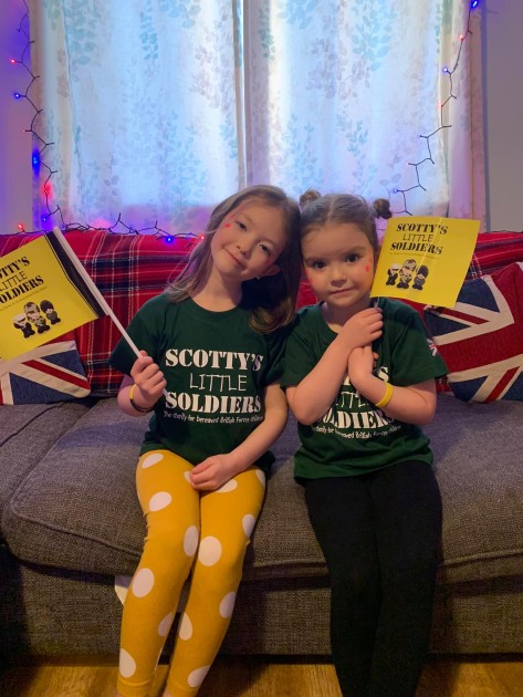 Two young girls supported by Scotty's Little Soldiers, the charity for bereaved military children