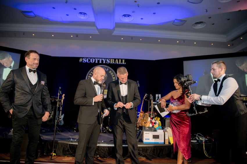 Digital marketing expert Lucy presenting prizes at Scotty's 2022 Ball with Billy Billingham and Jason Fox