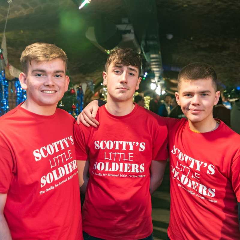 Teenagers who have expeirenced the death of a parent who servd in the British Armed Forces at Scotty's Little Soldiers Christmas Party